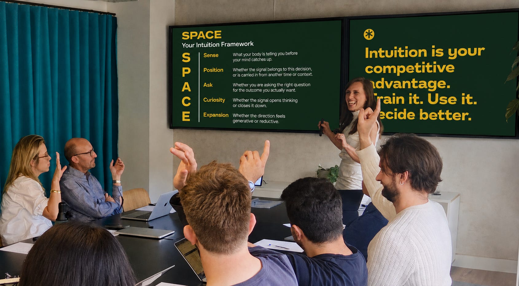 Livia Bernardini presenting the SPACE intuition framework to a team workshop, with participants raising their hands around the table